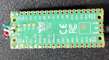 Back of Raspberry Pi Pico with USB connections to TP2 and TP3