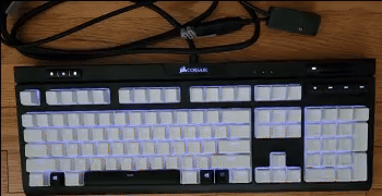 Keyboard RGB adjusting brightness with ambient lighting